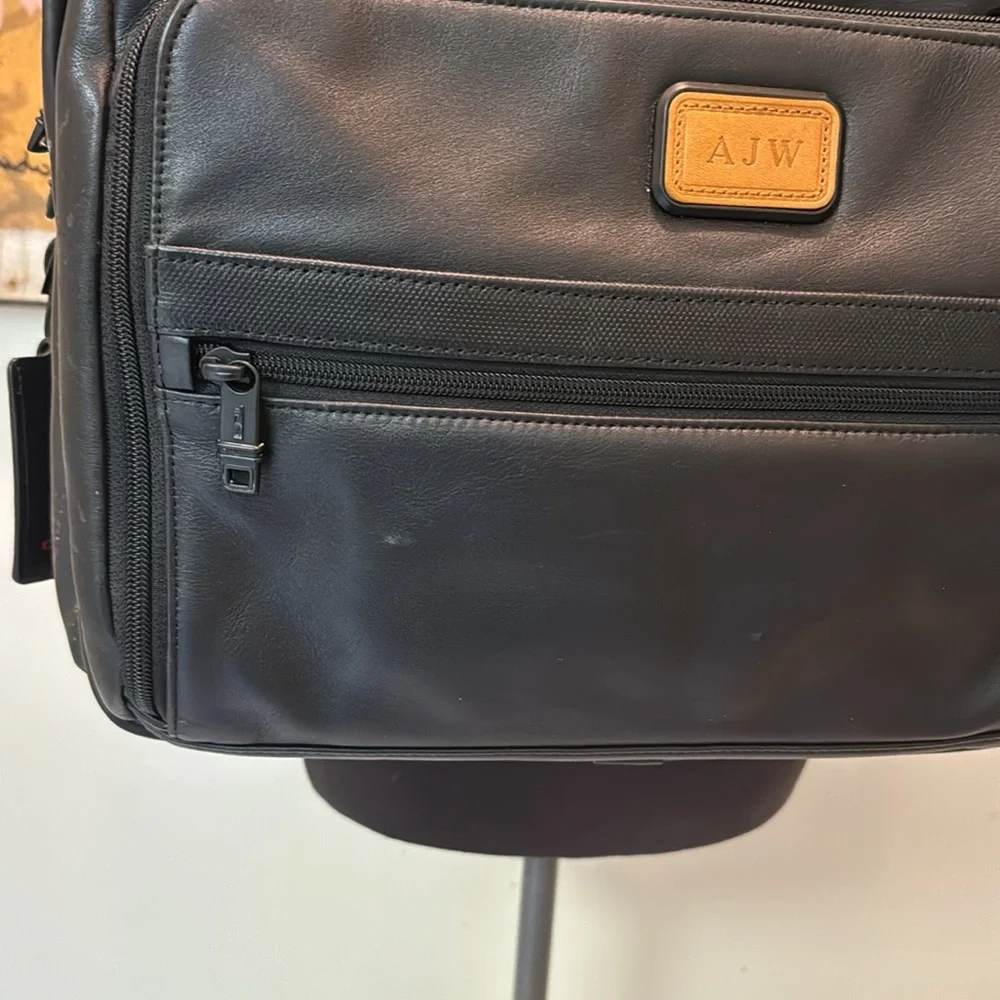 TUMi black leather computer briefcase carry-on VGC long strap multiple pockets